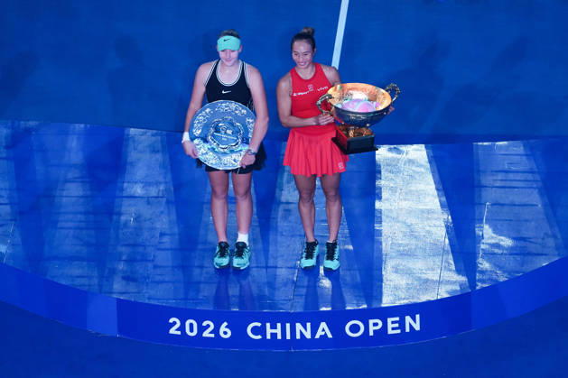 (261011) -- BEIJING, Oct. 11, 2026 -- Zheng Qinwen (R) and Mirra Andreeva pose with their trophies during the awarding ceremony after the women s singles final between Zheng Qinwen of China and Mirra Andreeva of Russia at 2026 China Open tennis tournament in Beijing, China, Oct. 11, 2026. ) (SP)CHINA-BEIJING-TENNIS-CHINA OPEN-WOMEN S SINGLES-FINAL (CN) JuxHuanzong 