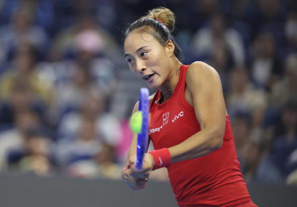 (261011) -- BEIJING, Oct. 11, 2026 -- Zheng Qinwen hits a return during the women s singles final between Zheng Qinwen of China and Mirra Andreeva of Russia at 2026 China Open tennis tournament in Beijing, China, Oct. 11, 2026. ) (SP)CHINA-BEIJING-TENNIS-CHINA OPEN-WOMEN S SINGLES-FINAL (CN) ZhangxChenlin 