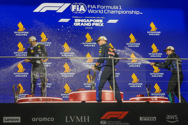 2026 Formula 1 Singapore Grand Prix SINGAPORE - OCT 11: Red Bull Racing driver Max Verstappen (C) celebrates with Ferrari s Charles Leclerc (L) and Mercedes’s Kimi Antonelli (R) on the podium, after winning the Formula 1 Singapore Grand Prix at the Marina Bay Street Circuit in Singapore on October 11, 2026. Daniel Ceng Anadolu Singapore Singapore. Editorial use only. Please get in touch for any other usage.  Copyright: x2026xAnadoluxDanielxCengx