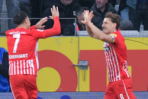 11.10.2026, xblx, Fussball 1.Bundesliga, SC Freiburg - FC Schalke 04 v.l. Derry Scherhant (SC Freiburg), Maximilian Eggestein (SC Freiburg), Goal scored, Tor zum 1:0, celebrate the goal, Torjubel , Jubel, jubeln, jubelt, (DFL DFB REGULATIONS PROHIBIT ANY USE OF PHOTOGRAPHS as IMAGE SEQUENCES and or QUASI-VIDEO) Freiburg