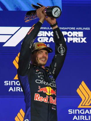Max Verstappen wins 2026 Formula 1 Singapore Grand Prix SINGAPORE - OCT 11: Red Bull Racing driver Max Verstappen celebrates on the podium after winning the Formula 1 Singapore Grand Prix at the Marina Bay Street Circuit in Singapore on October 11, 2026. Daniel Ceng Anadolu Singapore Singapore. Editorial use only. Please get in touch for any other usage. Copyright: x2026xAnadoluxDanielxCengx