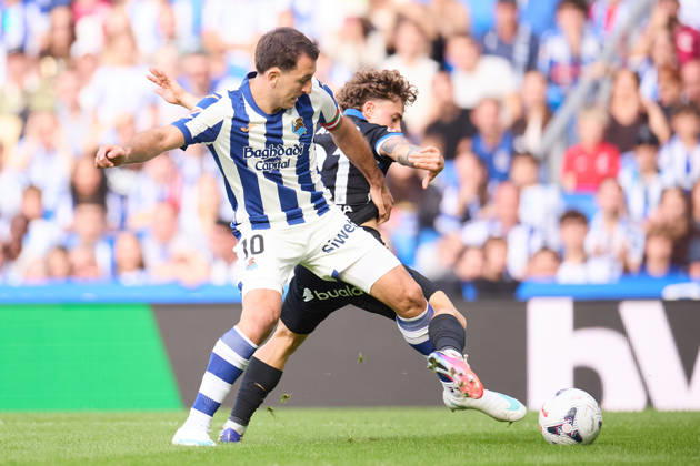 October 11, 2026, San Sebastian, Guipuzcoa, Spain: Mikel Oyarzabal of Real Sociedad competes for the ball with Mario Soriano of RC Deportivo de A Coruna during the LaLiga EA Sports match between Real Sociedad and RC Deportivo de A Coruna at Anoeta on October 11, 2026, in San Sebastian, Spain. Real Sociedad V RC Deportivo De La Coruna - La Liga EA Sports  - ZUMAa181 20261011_zaa_a181_136 Copyright: xRicardoxLarreinax