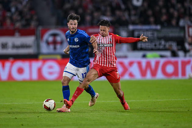 11.10.2026, Fussball, Saison 2026 2027, Bundesliga, SC Freiburg - FC Schalke 04, Adrian Gantenbein (FC Schalke 04), Derry Scherhant (SC Freiburg) xRHR-FOTO YYx Copyright: KROEGER RHR-FOTOx RHR-FOTO YY