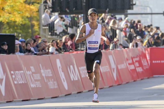 Suguru Osako of Japan crosses the finish line with a time of 02:07:34 placing 14th over all during 2026 Bank of America Chicago Marathon in Chicago on Sunday, Oct. 11, 2026.  CHI20261011105 MARKxBLACK