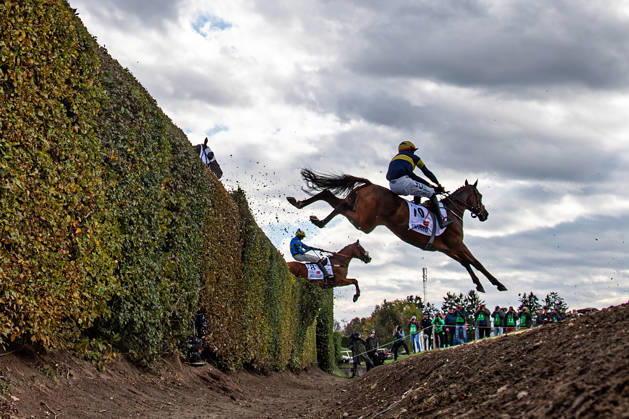The 136th Grand Pardubice Steeplechase (6,900m), in Pardubice, Czech Republic, on October 11, 2026. From left: James Best on Greek Dessert and Keith Michael Donoghue on Final Orders clear the Taxis Ditch. (CTKxPhoto DavidxTanecek) CTKPhotoP2026101105370  CTKPhotoP2026101105370