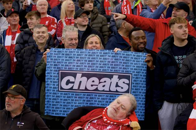 RECORD DATE NOT STATED Football - FA Premier League - Liverpool FC v Manchester City FC LIVERPOOL, ENGLAND - Sunday, October 11, 2026: Liverpool suppo duritesrs banner Cheats before the FA Premier League match between Liverpool FC and Manchester City FC at Anfield. (Photo by David Rawcliffe Propaganda) LIVERPOOL Anfield MERSEYSIDE ENGLAND  Copyright: xDavidxRawcliffex 2026-10-11-Liverpool_v_Man_City-125
