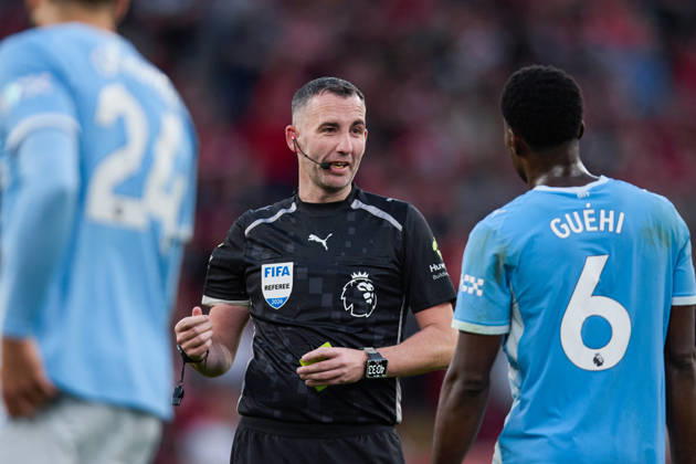 LIVERPOOL, ENGLAND - OCTOBER 11: The Referee Chris Kavanagh (L) argues with Marc Guehi of Manchester City (R) during the Premier League 2026 27 football match between Liverpool FC and Manchester City at Anfield on October 11, 2026 in Liverpool, England. (Photo by Koby Abbott Sports Press Photo) Copyright: xKobyxAbbott SportsxPressxPhotox Sportspressphoto_SPR252588