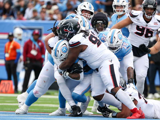 Oct 11, 2026; Nashville, TN, USA; Tennessee Titans running back Tony Pollard (20) is tackled for a loss of yards during the NFL, American Football Herren, USA regular season game between the Houston Texans and Tennessee Titans at Nissan Stadium. Mandatory Credit: -Cal Media NFL 2026: Texans Vs Titans OCT 11  - ZUMAc04_ 20261011_zma_c04_072 Copyright: xStephenxFurstx