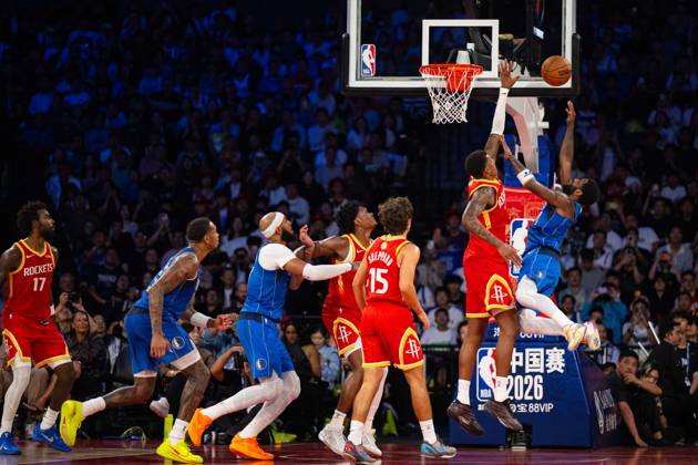 (261011) -- MACAO, Oct. 11, 2026 -- Kyrie Irving (1st R) of Dallas Mavericks shoots during the 2026-2027 NBA, Basketball Herren, USA preseason game between Dallas Mavericks and Houston Rockets in Macao, south China, on Oct. 11, 2026. ) (SP)CHINA-MACAO-BASKETBALL-NBA PRESEASON-ROCKETS VS MAVERICKS (CN) CheongxKamxKa 
