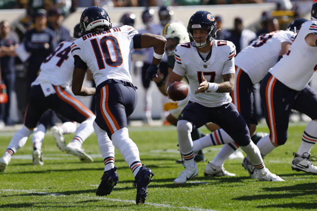 GREEN BAY, WI - OCTOBER 11: Chicago Bears quarterback Tyson Bagent (17) hands the ball off to Chicago Bears wide receiver Luther Burden III (10) during a game between the Green Bay Packers and the Chicago Bears on October 11, 2026 at Lambeau Field in Green Bay, WI. (Photo by Larry Radloff Icon Sportswire) NFL, American Football Herren, USA OCT 11 Bears at Packers EDITORIAL USE ONLY Icon2610110096
