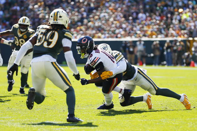 GREEN BAY, WI - OCTOBER 11: Chicago Bears wide receiver Luther Burden III (10) is tackled during a game between the Green Bay Packers and the Chicago Bears on October 11, 2026 at Lambeau Field in Green Bay, WI. (Photo by Larry Radloff Icon Sportswire) NFL, American Football Herren, USA OCT 11 Bears at Packers EDITORIAL USE ONLY Icon2610112458