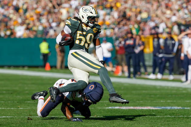 Oct 11, 2026; Green Bay, WI, USA; Green Bay Packers linebacker Ty ron Hopper (59) is tackled after making a interception during NFL, American Football Herren, USA game action against the Chicago Bears at Lambeau Field. Mandatory Credit: -Cal Media Green Bay USA - ZUMAc04_ 20261011_zma_c04_231 Copyright: xDarrenxLeex