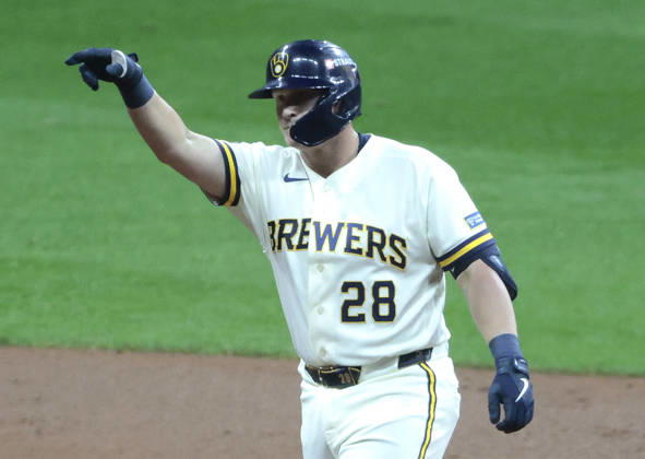 Milwaukee Brewers designated hitter Andrew Vaughn (28) celebrates on second base after hitting a double against the Los Angeles Dodgers in the second inning of an MLB, Baseball Herren, USA National League Championship Series playoff game at American Family Field in Milwaukee, Wisconsin, on Sunday, October 11, 2026.  MIL20261011708 TANNENxMAURY