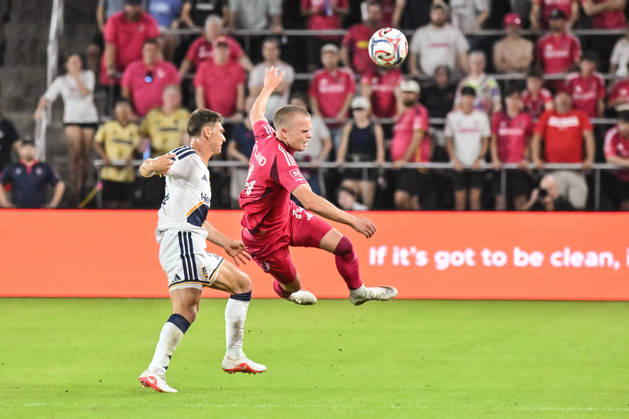 ST. LOUIS, MO - OCTOBER 11: Tomas Totland (14) of the St. Louis CITY SC gets sent flying through the air after being fouled by Harbor Miller (26) of the LA Galaxy during the MLS, Fussball Herren, USA regular season match where St. Louis CITY SC hosted LA Galaxy on Sunday October 11th, 2026, at Energizer Park in St. Louis City, MO. (Photo by Rick Ulreich Icon Sportswire) SOCCER: OCT 11 MLS St. Louis CITY SC vs LA Galaxy EDITORIAL USE ONLY Icon26101135