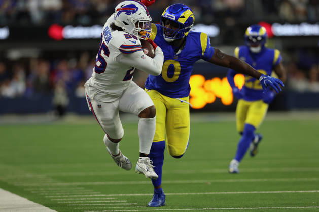 INGLEWOOD, CA - OCTOBER 12: Ty Johnson 26 of the Buffalo Bills goes airborne after being pushed out of bounds by Byron Young 0 of the Los Angeles Rams during an NFL, American Football Herren, USA game between the Buffalo Bills and the Los Angeles Rams on October 12, 2026, at SoFi Stadium in Inglewood, California. (Photo by Greg Fiore Icon Sportswire) NFL: OCT 12 Bills at Rams EDITORIAL USE ONLY Icon2610121894