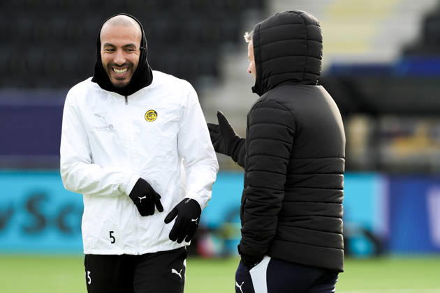 Soccer, Champions League 2026–2027, Bodo Glimt, Borussia Dortmund, Bodo, October 13, 2026: Coach Kjetil Knudsen and Haitam Aleesami during Bodo Glimt’s training session at Aspmyra Stadium, the day of the Champions League match between Bodo Glimt and Borussia Dortmund. Photo: Terje Pedersen, NTB, Bodo, Norway. EDITORIAL USE ONLY. RESTRICTED USE FOR BETTING COMPANIES Copyright: xTerjexPedersenx xNTBx