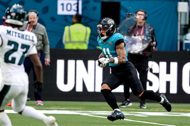 Jacksonville Jaguars v Philadelphia Eagles, International Series TOUCHDOWN Jacksonville Jaguars wide receiver Parker Washington (11) scores 51-yard touchdown run during the International Series match between Jacksonville Jaguars and Philadelphia Eagles at Tottenham Hotspur Stadium, London, UK on 11 October 2026. London Tottenham Hotspur Stadium London UK Editorial use only , Copyright: xManjitxNarotrax PSI-24992-0173