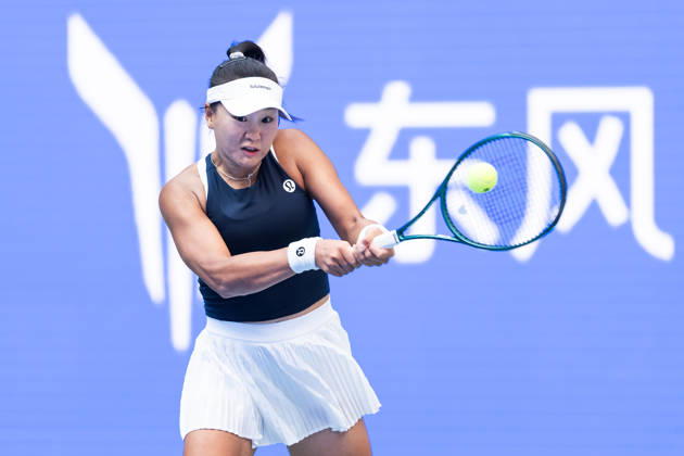 October 13, 2026, Wuhan, Hubei, China: Hanyu Guo of China seen in action with Sorana Cirstea of Romania ( not in view) during the Wuhan Open final match at the Optics Valley International Tennis Center. Hanyu Guo defeated Sorana Cirstea with a score of 1-6, 7-6, 7-5. Wuhan China - ZUMAs197 20261013_aaa_s197_102 Copyright: xRenxYongx