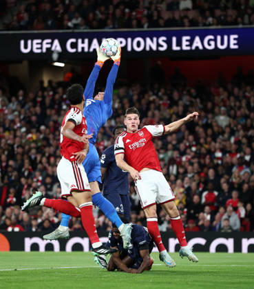 London, England, 13th October 2026. Berke Ozer of LOSC Lille collects the ball as Viktor Gyokeres of Arsenal waits for the fumble during the Arsenal vs LOSC Lille UEFA Champions League match at the Emirates Stadium, London. Picture credit should read: David Klein Sportimage EDITORIAL USE ONLY. No use with unauthorised audio, video, data, fixture lists, club league logos or live services. Online in-match use limited to 120 images, no video emulation. No use in betting, games or single club league player publications. SPI_023_DK_Arsenal_Lille SPI-5065-0024