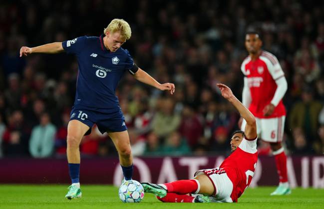 Mikel Merino of Arsenal Hakon Arnar Haraldsson of Lille Arsenal v Lille, UEFA Champions League, Football, Emirates Stadium, London, UK - 13 Oct 2026London Emirates Stadium United Kingdom  Copyright: xJavierxGarcia Shutterstockx 17213973t