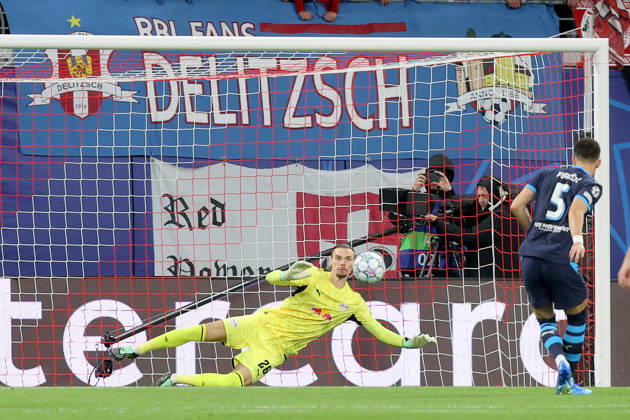 13.10.2026, xtgx, Fussball, UEFA Champions League, RB Leipzig - PSV Eindhoven, v.l. Maarten Vandevoordt (RB Leipzig) hält den Elfmeter von Ivan Perisic (PSV Eindhoven) (DFL DFB REGULATIONS PROHIBIT ANY USE OF PHOTOGRAPHS as IMAGE SEQUENCES and or QUASI-VIDEO) Leipzig