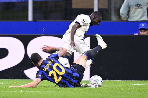 Inter Milan v Club Brugge - UEFA Champions League MILAN, ITALY - OCTOBER 13 : Calhanoglu Hakan midfielder of Inter Milan making a fault on Forbs Carlos forward of Club Brugge during the UEFA Champions League 2026 27 League Phase matchday 2 match between Inter Milan and Club Brugge on October 13, 2026 in Milan, Italy, 13 10 2026 Milan Italy  Copyright: xTomasxSiskx