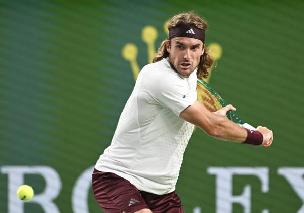 (261014) -- SHANGHAI, Oct. 14, 2026 -- Stefanos Tsitsipas of Greece hits a return during the men s round of 16 match against Daniil Medvedev of Russia at the 2026 ATP, Tennis Herren tour Shanghai Masters tennis tournament in Shanghai, China, Oct. 14, 2026. ) (SP)CHINA-SHANGHAI-TENNIS-SHANGHAI MASTERS-MEN S SINGLES (CN) ChenxHaoming 