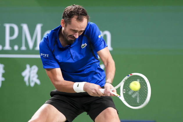 (261014) -- SHANGHAI, Oct. 14, 2026 -- Daniil Medvedev of Russia hits a return during the men s round of 16 match against Stefanos Tsitsipas of Greece at the 2026 ATP, Tennis Herren tour Shanghai Masters tennis tournament in Shanghai, China, Oct. 14, 2026. ) (SP)CHINA-SHANGHAI-TENNIS-SHANGHAI MASTERS-MEN S SINGLES (CN) WangxXiang 