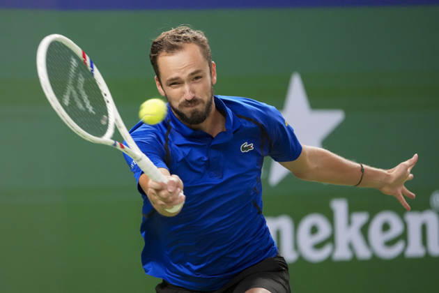 (261014) -- SHANGHAI, Oct. 14, 2026 -- Daniil Medvedev of Russia hits a return during the men s round of 16 match against Stefanos Tsitsipas of Greece at the 2026 ATP, Tennis Herren tour Shanghai Masters tennis tournament in Shanghai, China, Oct. 14, 2026. ) (SP)CHINA-SHANGHAI-TENNIS-SHANGHAI MASTERS-MEN S SINGLES (CN) WangxXiang 