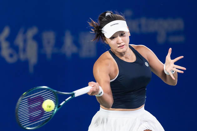 October 14, 2026, Wuhan, Hubei, China: Hanyu Guo of China plays against Katie Volynets of USA ( not in view) during the Wuhan Open final match at the Optics Valley International Tennis Center. Hanyu Guo defeated Katie Volynets with a score of 6-4, 4-6, 7-6. Wuhan China - ZUMAs197 20261014_aaa_s197_092 Copyright: xRenxYongx