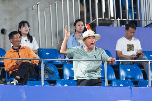 October 14, 2026, Wuhan, Hubei, China: A fan cheers on Hanyu Guo of China after the second round on Day 3 of the Wuhan Open at the Optics Valley International Tennis Center in Wuhan. Hanyu Guo defeated Katie Volynets with a score of 6-4, 4-6, 7-6. Wuhan China - ZUMAs197 20261014_aaa_s197_109 Copyright: xRenxYongx