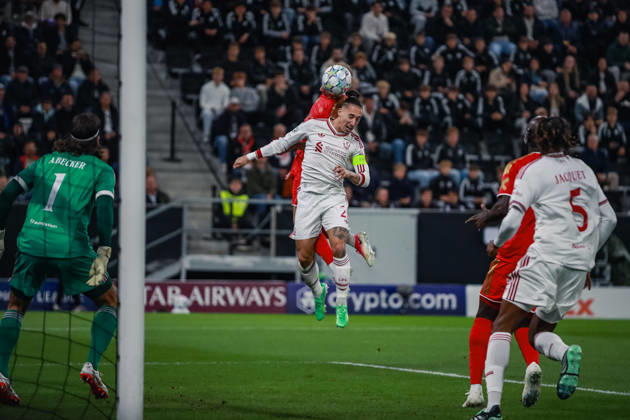 SOCCER - UEFA CL, LASK vs Liverpool LINZ,AUSTRIA,14.OCT.26 - SOCCER - UEFA Champions League, Linzer ASK vs Liverpool FC. Image shows Krystof Danek (LASK) and Kostas Tsimikas (Liverpool).  GEPAxpictures xManuelxBinder