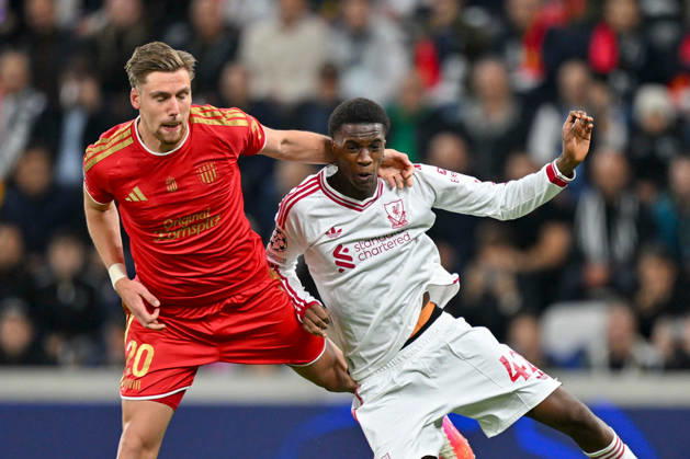 SOCCER - UEFA CL, LASK vs Liverpool LINZ,AUSTRIA,14.OCT.26 - SOCCER - UEFA Champions League, Linzer ASK vs Liverpool FC. Image shows Kasper Joergensen (LASK) and Trey Nyoni (Liverpool).  GEPAxpictures xAvnixRetkoceri