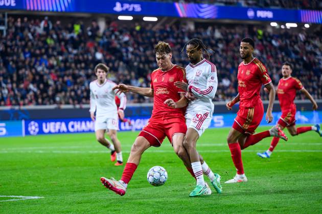 SOCCER - UEFA CL, LASK vs Liverpool LINZ,AUSTRIA,14.OCT.26 - SOCCER - UEFA Champions League, Linzer ASK vs Liverpool FC. Image shows Joao Tornich (LASK) and Bradley Barcola (Liverpool).  GEPAxpictures xChristianxMoser