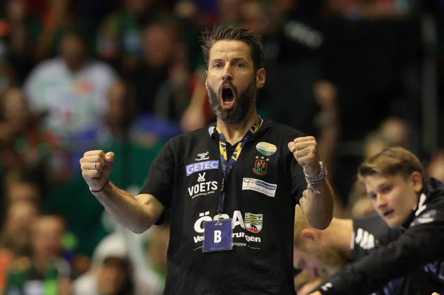 14.10.2026, xtgx, Handball Champions Legaue, SC Magdeburg - Industria Kielce emspor, v.l. Bennet Wiegert (Magdeburg, Trainer) Jubel, Torjubel, jubelt ueber das Tor, celebrate the goal, celebration Magdeburg