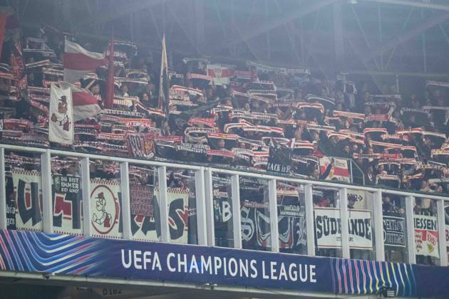 VFB Stuttgart fans with scarfs during UEFA Champions league match , SK Slovan Bratislava - VFB Stuttgart , 14. october 2026, Tehelne pole Stadium, Bratislava, Slovakia Copyright: xMICHALxFAJT,ZOSPORTU.SKx MAR_6733