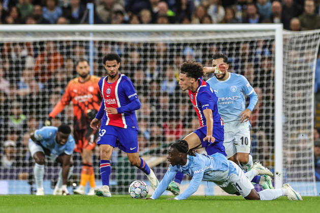 UEFA Champions League Matchday 2 of 8 Manchester City v Paris Saint-Germain Jeremy Doku of Manchester City is fouled by Maghnes Akliouche of Paris Saint-Germain during the UEFA Champions League Matchday 2 of 8 match Manchester City vs Paris Saint-Germain at City of Manchester Stadium, Manchester, United Kingdom on 14 October 2026 (Photo by Mark Cosgrove News Images) Manchester City of Manchester Stadium Greater Manchester United, ManU Kingdom Copyright: xMarkxCosgrove NewsxImagesx