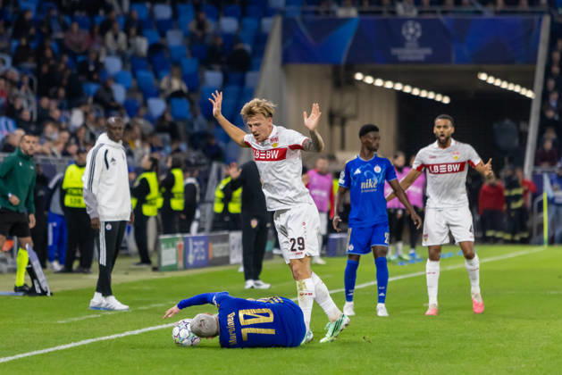 Cristian Martinez of SK Slovan Bratislava and Finn Jeltsch of VfB Stuttgart seen during UEFA Champions league League phase game between teams of SK Slovan Bratislava and VfB Stuttgart (Dominika Kortvelyesiova Ball Raw Images) Bratislava Tehelne Pole stadium Slovakia Copyright: xDominikaxKortvelyesiovax DKOR6757
