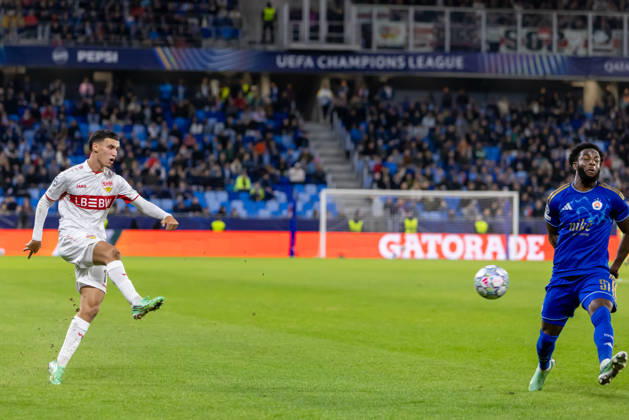 DÅ¾enan PejÄinovic of VfB Stuttgart and Sandro Cruz of SK Slovan Bratislava seen during UEFA Champions league League phase game between teams of SK Slovan Bratislava and VfB Stuttgart (Dominika Kortvelyesiova Ball Raw Images) Bratislava Tehelne Pole stadium Slovakia Copyright: xDominikaxKortvelyesiovax DKOR6799