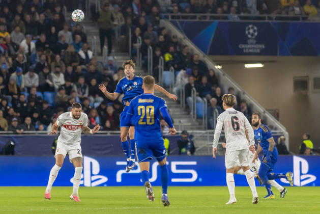 Jeff Chabot of VfB Stuttgart and Andraz Sporar of SK Slovan Bratislava seen during UEFA Champions league League phase game between teams of SK Slovan Bratislava and VfB Stuttgart (Dominika Kortvelyesiova Ball Raw Images) Bratislava Tehelne Pole stadium Slovakia Copyright: xDominikaxKortvelyesiovax DKR_0989