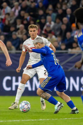 Grischa Promel of VfB Stuttgart and Cristian Martinez of SK Slovan Bratislava seen during UEFA Champions league League phase game between teams of SK Slovan Bratislava and VfB Stuttgart (Dominika Kortvelyesiova Ball Raw Images) Bratislava Tehelne Pole stadium Slovakia Copyright: xDominikaxKortvelyesiovax DKR_0997