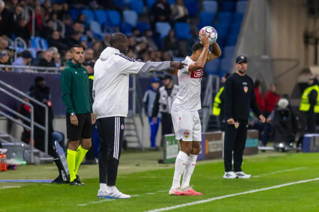 Head coach of SK Slovan Bratislava Yaya Toure and Josha Vagnoman of VfB Stuttgart seen during UEFA Champions league League phase game between teams of SK Slovan Bratislava and VfB Stuttgart (Dominika Kortvelyesiova Ball Raw Images) Bratislava Tehelne Pole stadium Slovakia Copyright: xDominikaxKortvelyesiovax DKR_1002