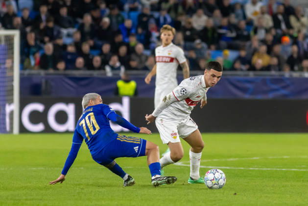 Cristian Martinez of SK Slovan Bratislava and DÅ¾enan PejÄinovic of VfB Stuttgart seen during UEFA Champions league League phase game between teams of SK Slovan Bratislava and VfB Stuttgart (Dominika Kortvelyesiova Ball Raw Images) Bratislava Tehelne Pole stadium Slovakia Copyright: xDominikaxKortvelyesiovax DKR_1046