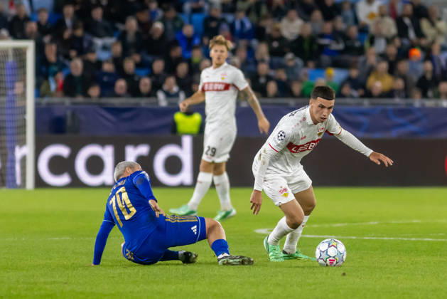 Cristian Martinez of SK Slovan Bratislava and DÅ¾enan PejÄinovic of VfB Stuttgart seen during UEFA Champions league League phase game between teams of SK Slovan Bratislava and VfB Stuttgart (Dominika Kortvelyesiova Ball Raw Images) Bratislava Tehelne Pole stadium Slovakia Copyright: xDominikaxKortvelyesiovax DKR_1047