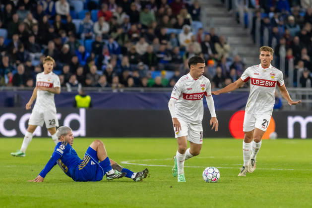 Cristian Martinez of SK Slovan Bratislava and DÅ¾enan PejÄinovic of VfB Stuttgart seen during UEFA Champions league League phase game between teams of SK Slovan Bratislava and VfB Stuttgart (Dominika Kortvelyesiova Ball Raw Images) Bratislava Tehelne Pole stadium Slovakia Copyright: xDominikaxKortvelyesiovax DKR_1051