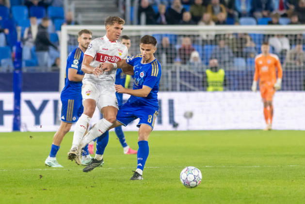 Grischa Promel of VfB Stuttgart and Artur Gajdos of SK Slovan Bratislava seen during UEFA Champions league League phase game between teams of SK Slovan Bratislava and VfB Stuttgart (Dominika Kortvelyesiova Ball Raw Images) Bratislava Tehelne Pole stadium Slovakia Copyright: xDominikaxKortvelyesiovax DKR_1189