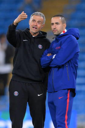 MANCHESTER, ENGLAND - OCTOBER 14: Paris Saint-Germain Manager Luis Enrique with his coaching staff during the UEFA Champions League 2026 27 League Phase MD2 match between Manchester City and Paris Saint-Germain at City of Manchester Stadium on October 14, 2026 in Manchester, England. Copyright: xMBxMediax