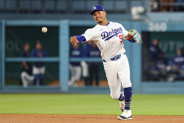 MLB, Baseball Herren, USA NLCS Game 3 - Los Angeles Dodgers vs Milwaukee Brewers Dodgers shortstop Mookie Betts (50) throws to first base in the fifth inning of game 3 of the National League Championship Series between the Los Angeles Dodgers and the Milwaukee Brewers at Uniqlo Field in Dodger Stadium in Los Angeles, California, USA, 14 October 2026. LOS ANGELES CALIFORNIA United States  Copyright: xCHRISxTORRESx