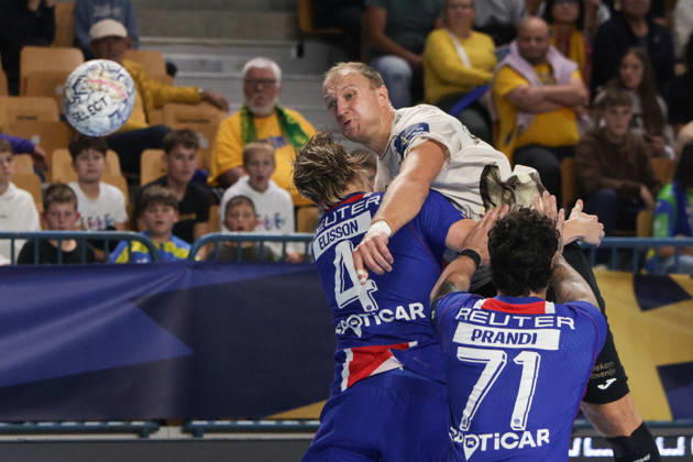 (261015) -- CELJE, Oct. 15, 2026 -- Ziga Mlakar (top C) of RK Celje Pivovarna Lasko shoots the ball during the European Handball Federation (EHF) Champions League match between RK Celje Pivovarna Lasko and Paris Saint-Germain at Zlatorog Sports Hall in Celje, Slovenia, Oct.14, 2026. (Photo by Xinhua) (SP)SLOVENIA-CELJE-HANDBALL-EHF CHAMPIONS LEAGUE-RK CELJE PIVOVARNA LASKO VS PARIS SAINT-GERMAIN ZeljkoxStevanic 