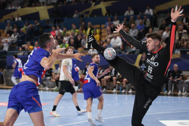 (261015) -- CELJE, Oct. 15, 2026 -- Ferran Sole Sala (L) of Paris Saint-Germain shoots the ball during the European Handball Federation (EHF) Champions League match between RK Celje Pivovarna Lasko and Paris Saint-Germain at Zlatorog Sports Hall in Celje, Slovenia, Oct.14, 2026. (Photo by Xinhua) (SP)SLOVENIA-CELJE-HANDBALL-EHF CHAMPIONS LEAGUE-RK CELJE PIVOVARNA LASKO VS PARIS SAINT-GERMAIN ZeljkoxStevanic 